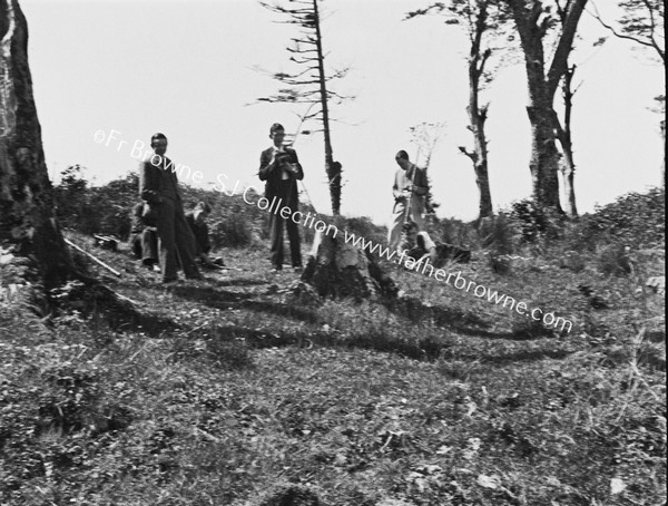 WITH BOY-SCOUTS ON CAAAIRNS HILL